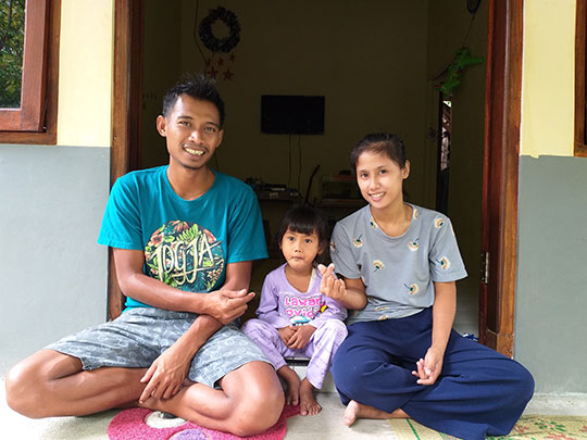 Dwi Rahayu with his family at his Habitat house in Yogyakart