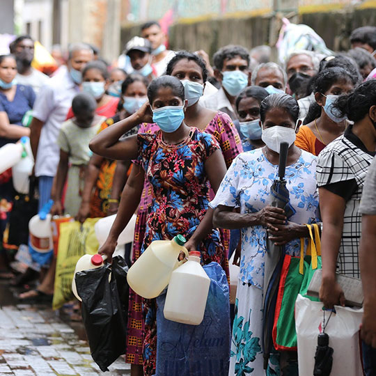 Sri Lankans queuing for necessities