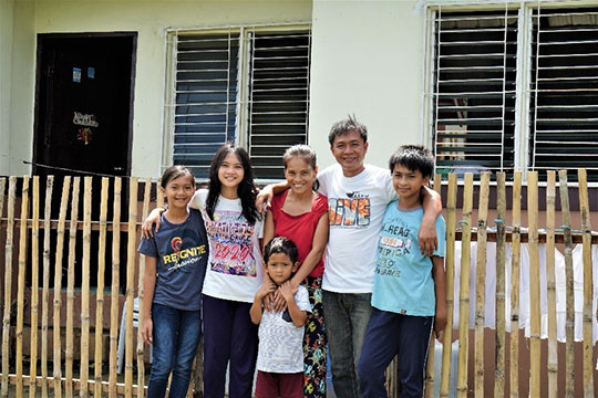 Pastor Tito and family at home in Tacloban, Philippines